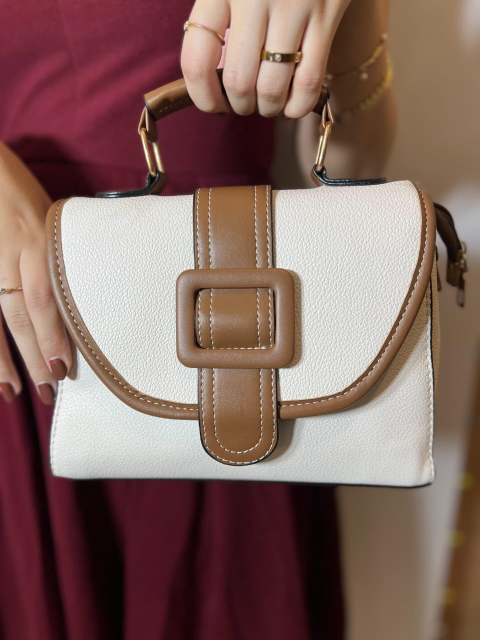 A Buckle Band cross body bag